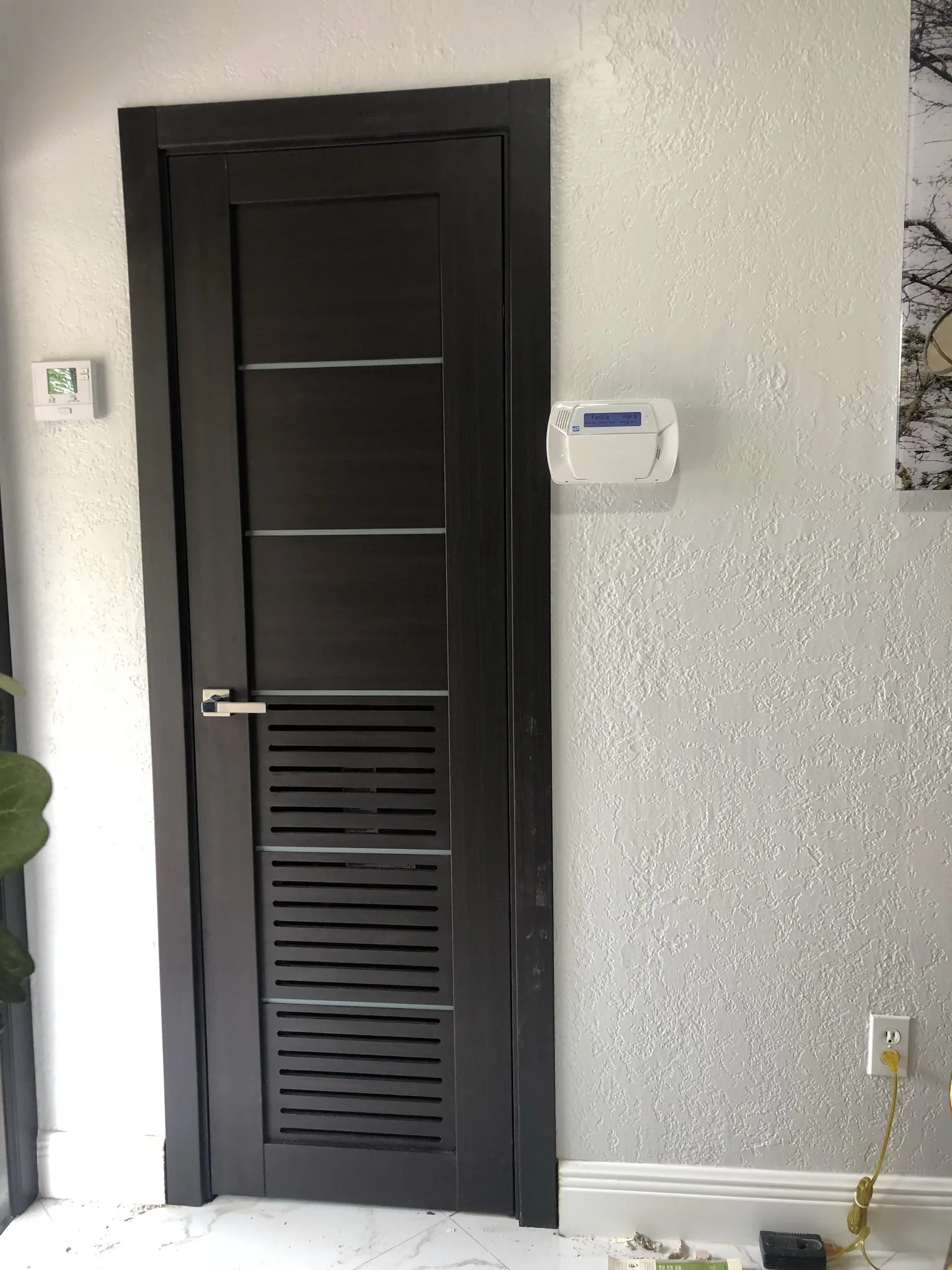 Wenge door with a louvered vent and glass inlays — interior door supplied and installed by Slab & Trim