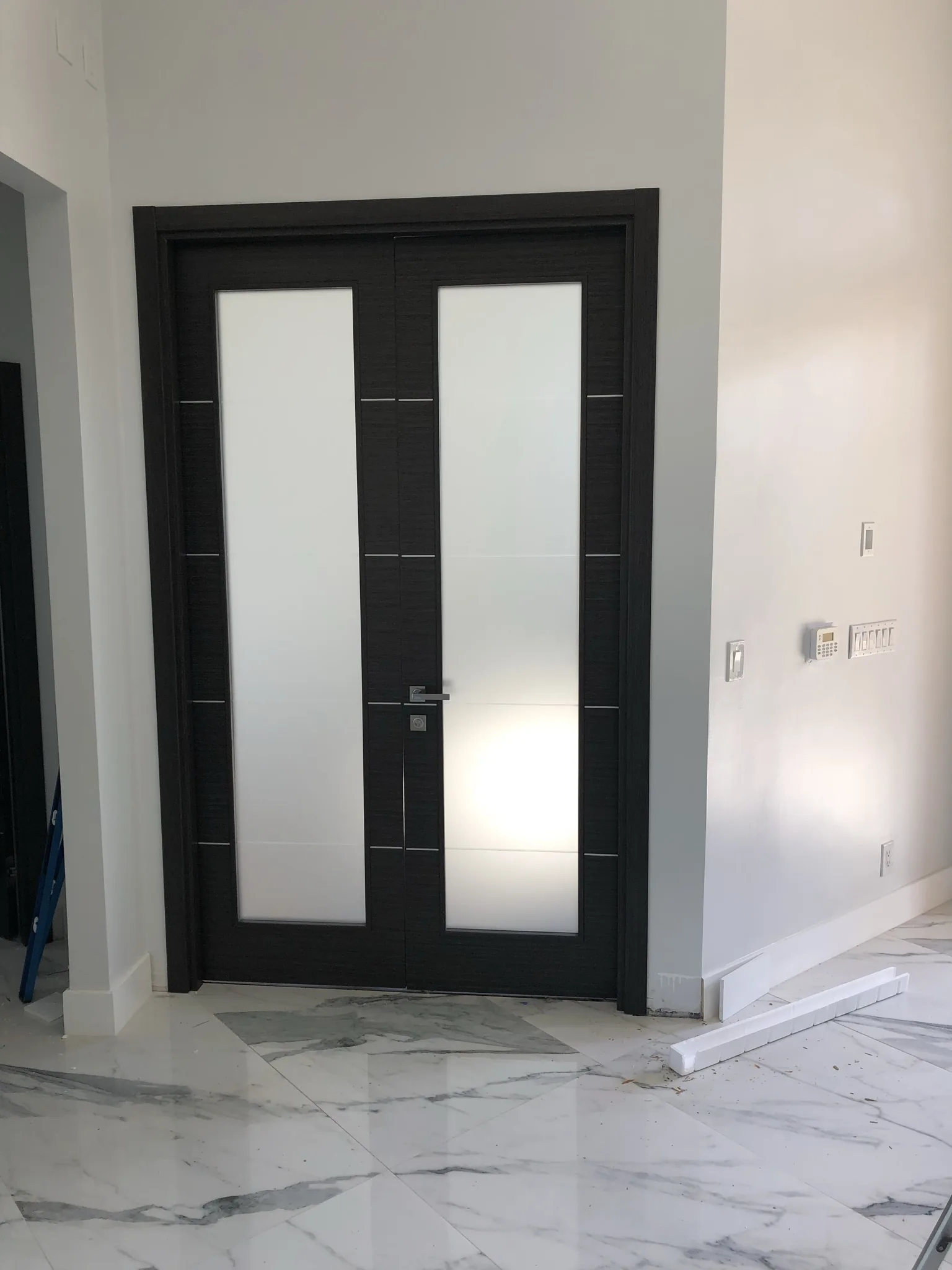 Wenge door with frosted-glass panels — interior door supplied and installed by Slab & Trim