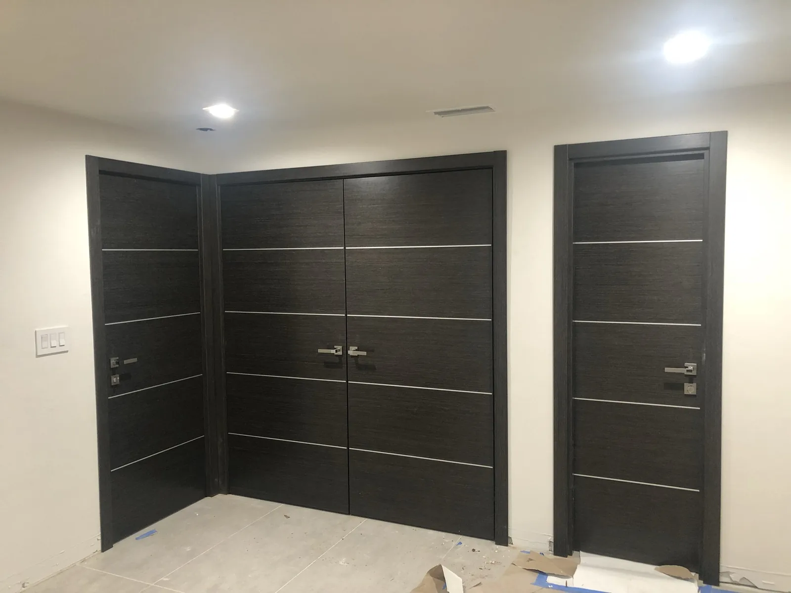 Wenge double doors with aluminum inlays — interior door supplied and installed by Slab & Trim