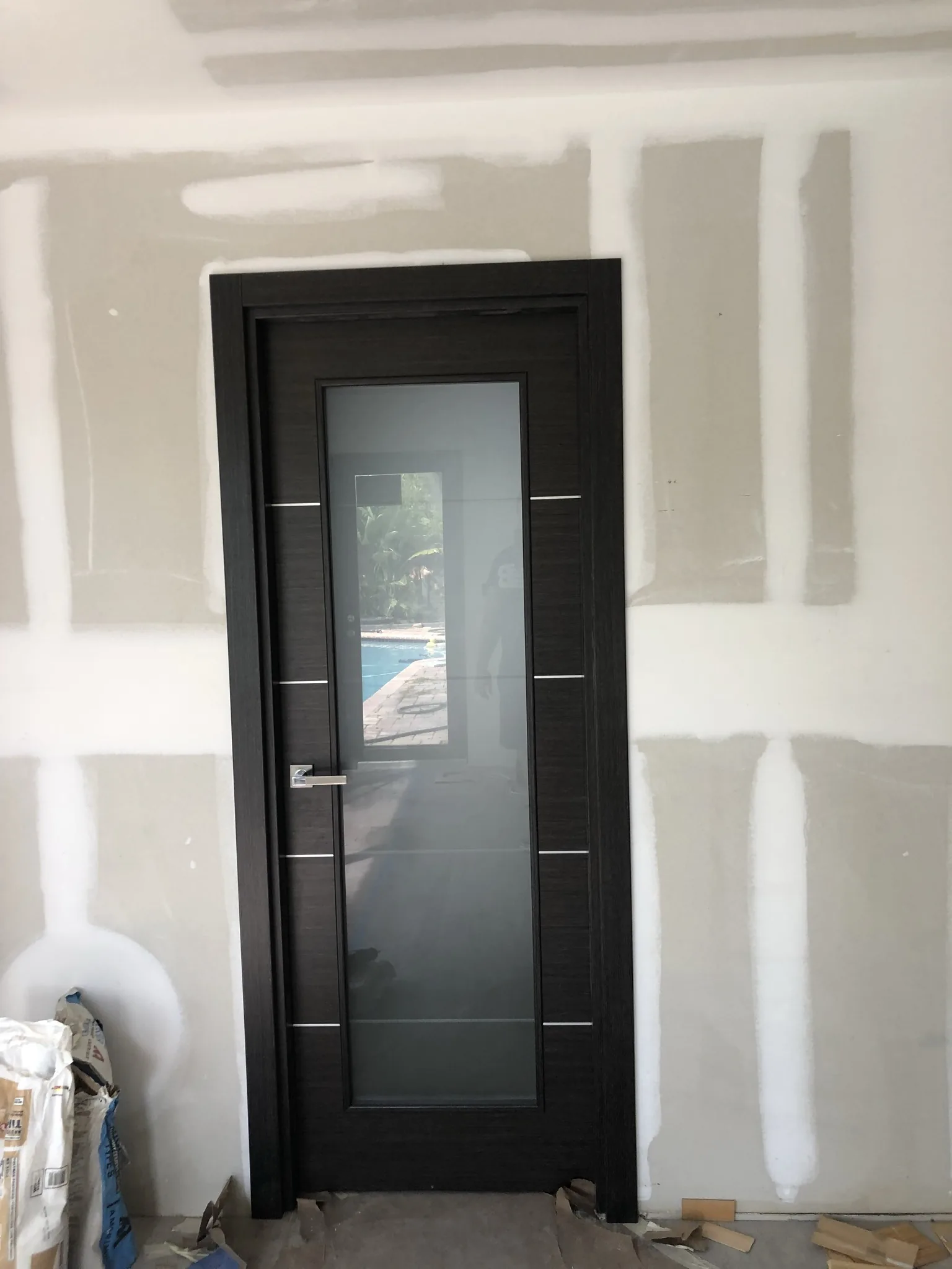Wenge door with a frosted-glass panel — interior door supplied and installed by Slab & Trim