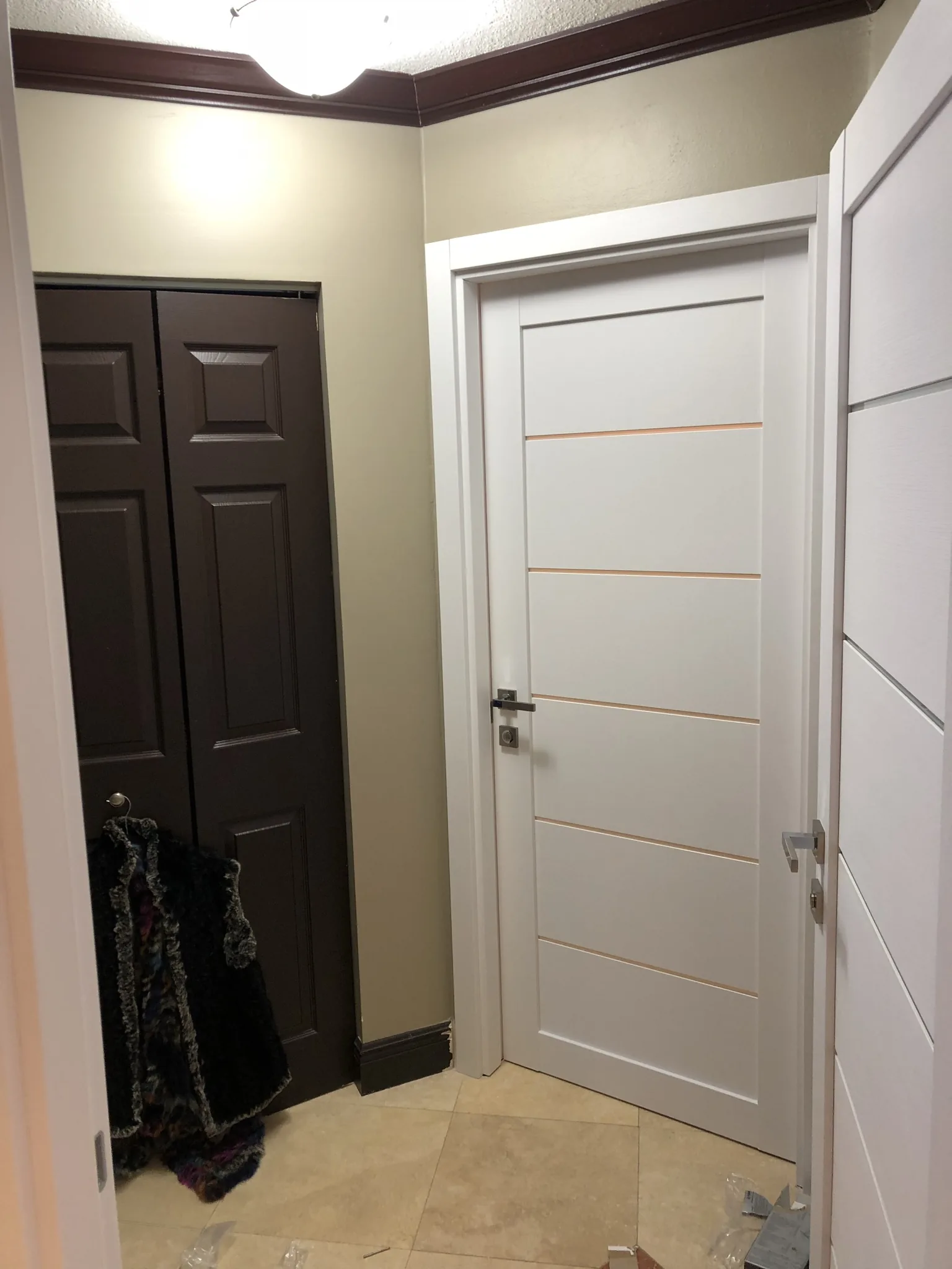 White modern door with slim aluminum inlays — interior door supplied and installed by Slab & Trim